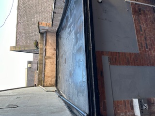 Flat roof and chimney