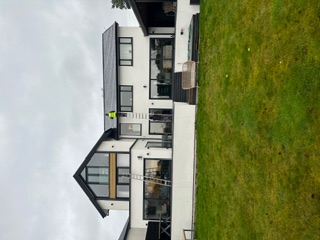 Large modern house full re-roof by J&B Roofing Solutions